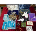 A box/tray of costume jewellery including studs, bangles etc.