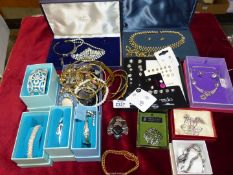A box/tray of costume jewellery including studs, bangles etc.