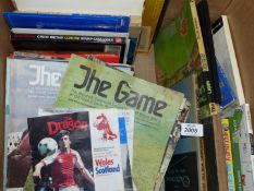 A quantity of books to include Sporting Magazines, Lawn Expert, The Wombles to the Rescue etc.