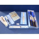 A quantity of boxed Joseph Rodgers & Sons Ltd cutlery including cake knife, carving set, tea knives,