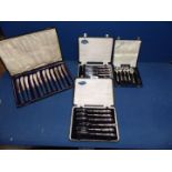 Two cased sets of Kings Pattern butter knives and pastry forks with sterling silver hallmarked