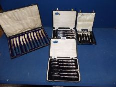 Two cased sets of Kings Pattern butter knives and pastry forks with sterling silver hallmarked