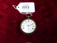 A silver cased pocket watch with separate seconds dial, glass a/f.