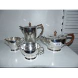 A plated four piece Teaset by T.D & S, tea and hot water pots, milk jug and sugar bowl.