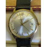 A Gents Garrard Automatic wristwatch in gold case,