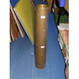 A brass shell case, 31" tall (base missing).