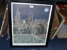 A framed Print of a religious building with a figure in a lit window, gentleman in the grounds,