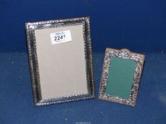 Two silver frames, Chester 1905 and W.I. Broadway & Co., Birmingham 1967.