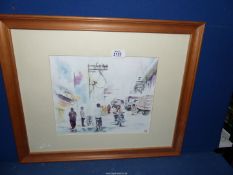 A framed and mounted Watercolour depicting a street scene, possibly Indian,