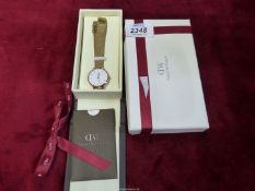 A ladies Daniel Wellington watch, Japanese movement and mesh strap, boxed with manual.