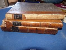 Three volumes of The Holy Bible published by Cassell Petter and Galpin