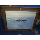 A large Coulson Print of a Lancaster Bomber, 37" x 29 1/4".