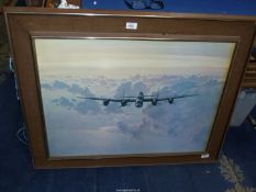 A large Coulson Print of a Lancaster Bomber, 37" x 29 1/4".