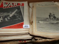 A large quantity of The War Illustrated magazines.