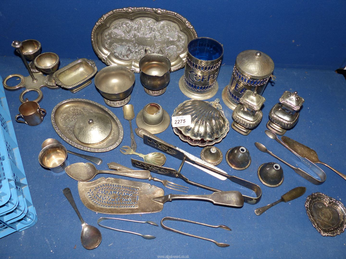 A quantity of plated items including cake tongs, fish server, small souvenir Tyg, card trays etc.