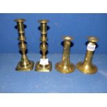 Two pairs of brass candlesticks including dimple effect, 5'' tall, and with weighted bases,