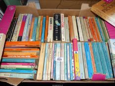 A box of Paperback novels, Watership Down, The Runaways, Treasure Island, etc.