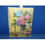 An unframed Oil on canvas of vase of flowers and candlestick still life,