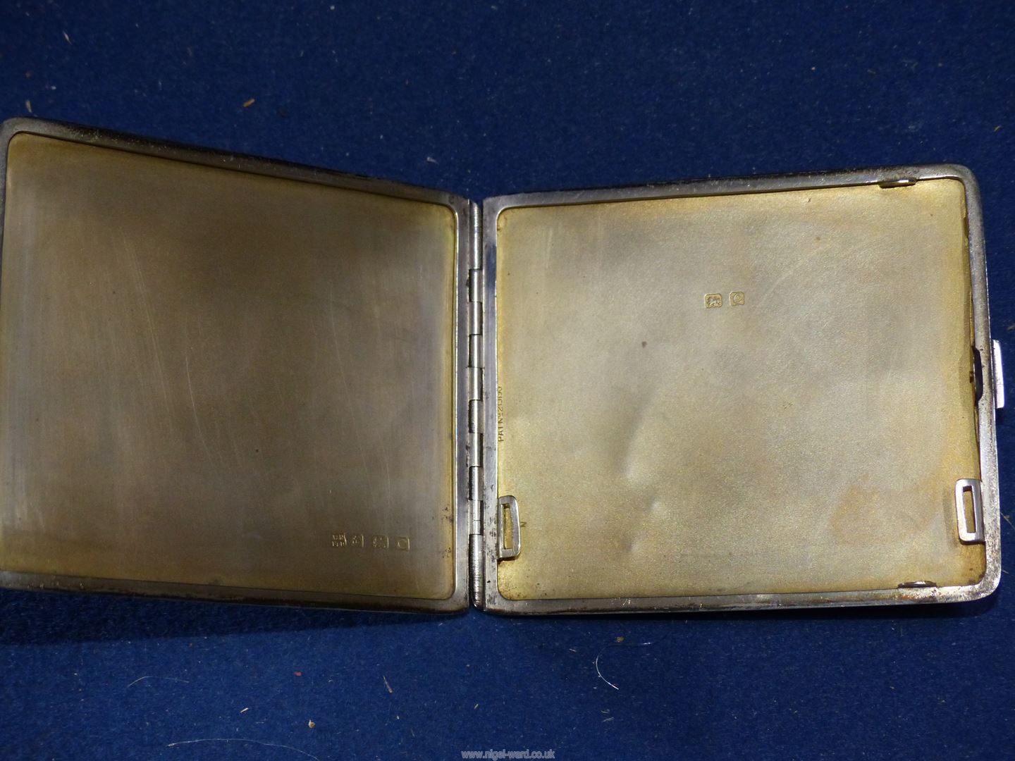 A silver cigarette case with engine turn detail, Birmingham 1927 by William Neale & Son Ltd., 114g. - Image 2 of 2