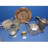 A plated three piece teaset, two Pewter tankards,