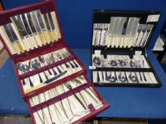 Two cased part sets of cutlery.