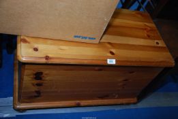 A pine blanket box, 29 1/2" wide x 16" deep x 19" high.