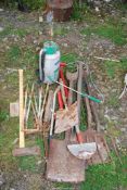 A garden sprayer, 'Wolf' log splitter garden tools, and croquet hoops.