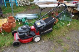 A Mountfield mower with 4.5 Honda engine and grass box - working order.