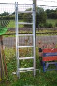 A dual purpose ladder - six rung extension and opens to step ladder.
