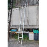 A sixteen aluminum double ladder.