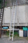 A sixteen aluminum double ladder.