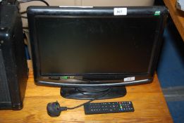 A 'Logic' Television with built-in DVD and remote.