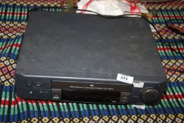 A LG VHS video recorder.
