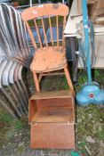Old painted kitchen chair and a wooden bread bin.