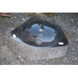 A granite polished sink, 20 ¼ " (corner to corner) x 6" deep.