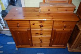 A Pine sideboard with six drawers and two cupboards - 46" wide x 17" depth x 32½" high.