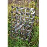 A medium wine rack - holds 24 bottles.