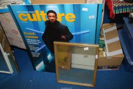 A mirror and a poster for the Sunday Times 'Cultures'.