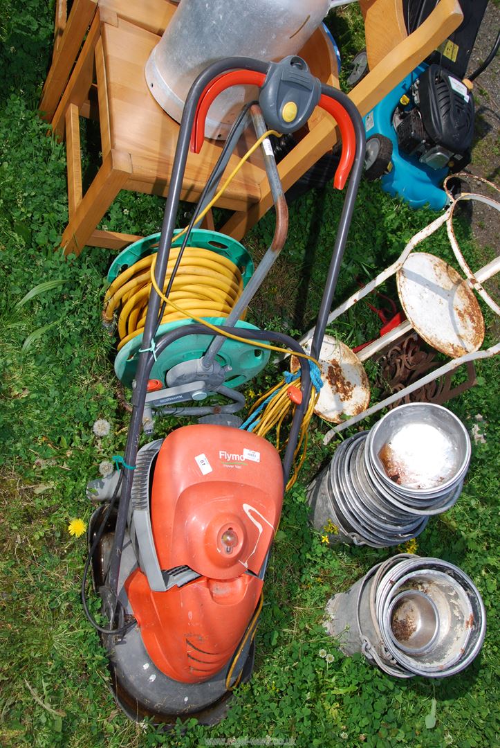 Flymo Lawn mower (as seen), hose and reel.