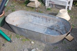 A Galvanised bath 4ft long x 20" wide x 12" deep.