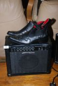 An Amplifier and a pair of 'Guciani' Gents western ankle boots, size:10.