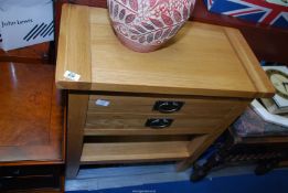 An oak two drawer Kitchen table, 27 1/2" x 13 3/4" x 29 1/2" high.