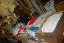 A box of Disney cushions, throws, bed linen, plus a vase of artificial flowers, etc.