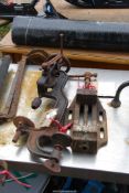 A vintage hand operated pillar drill and drill vice.
