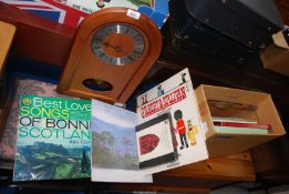 A Welsh clock and a box of classical LP's.