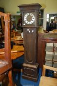 An Oak finished Grandfather Clock with 30 hour movement,