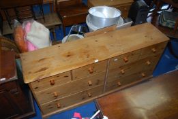 A pine sideboard with four top drawers and four lower drawers - 6' wide x 17" depth x 35" high.