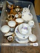 A quantity of Victorian china in Violet design to include; teapot, milk jug, eight cups,