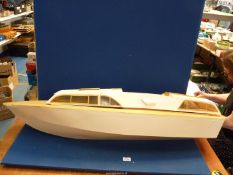 A Fairey Huntsman 31 model boat (designed for radio control but absent), 48" long x 15" wide.