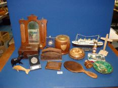 A quantity of miscellanea including letter rack, hand mirror with wooden back and handle,